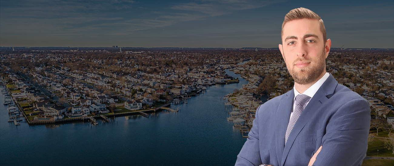 Photo of Richard Hochhauser in front a Long Island Skyline