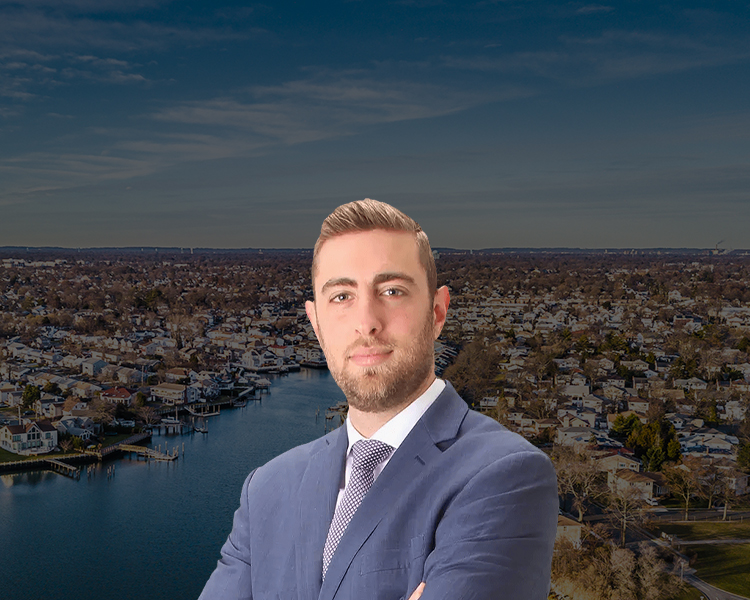 Photo of Richard Hochhauser in front a Long Island Skyline