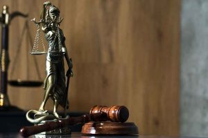 Lady justice statue with gavel